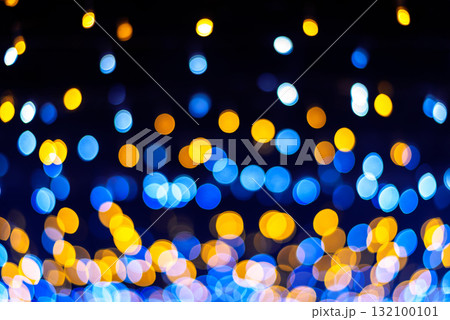 Abstract  blue and yellow light bokeh background , Christmas and Happy new year concept 132100101