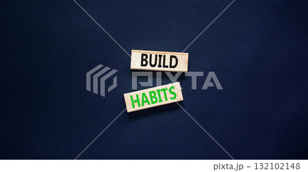 Build habits symbol. Concept word Build habits on beautiful wooden blocks. Beautiful black paper background. Business build habits concept. Copy space. 132102148