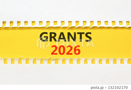 Grants 2026 symbol. Concept words Grants 2026 on beautiful yellow paper. Beautiful white paper background. Business and grants 2026 concept. Copy space. 132102170