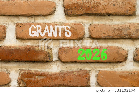 Grants 2026 symbol. Concept words Grants 2026 on beautiful brown brick wall. Beautiful brown brick wall background. Business and grants 2026 concept. Copy space. 132102174
