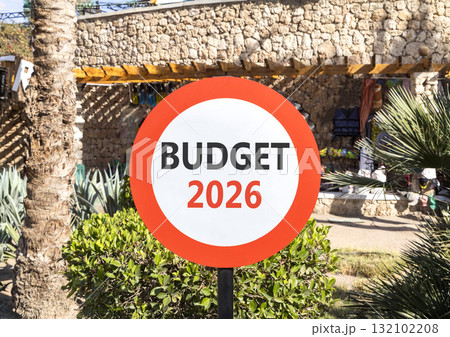 Budget 2026 symbol. Concept words Budget 2026 on beautiful white and red road sign. Beautiful palm trees palm-trees background. Business and budget 2026 concept. Copy space. 132102208