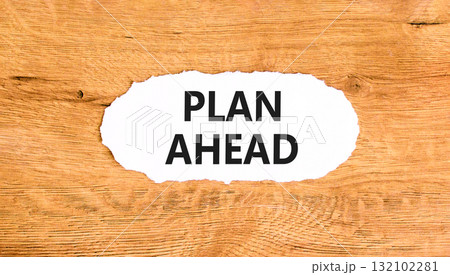 Plan ahead symbol. Concept word Plan ahead on beautiful white paper. Beautiful wooden paper background. Business plan ahead concept. Copy space. 132102281