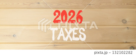 2026 taxes new year symbol. Concept words 2026 taxes on beautiful wooden wall. Beautiful wooden wall background. Business and 2026 taxes new year concept. Copy space. 2026 taxes new year symbol. Concept words 2026 taxes on beautiful wooden wall. Beautiful wooden wall background. Business and 2026 taxes new year concept. Copy space. 132102282