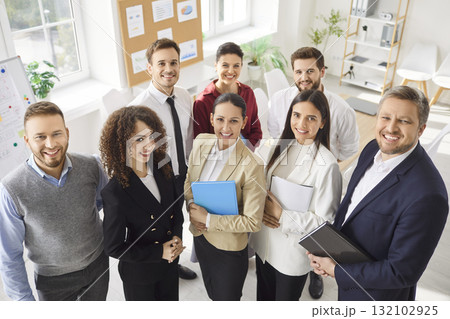 Group Portrait Of Happy Business Team Working Together Group Portrait Of Happy Business Team Working Together 132102925