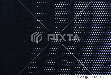 Fabric with white dots on a blue background. 132105287