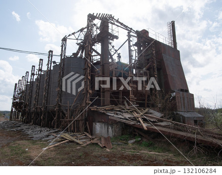 dilapidated industrial building with debris, derelict factory featuring rusted structures dilapidated industrial building with debris, derelict factory featuring rusted structures 132106284