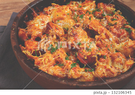 Baked fish with potatoes and cheese, gratin, homemade, no people, 132106345