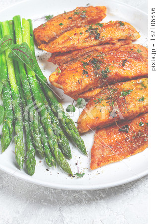 fried fish fillet, tilapia with asparagus, homemade, no people, 132106356
