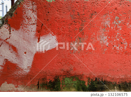 Old orange color paint on old concrete wall texture. Old orange color paint on old concrete wall texture. 132106575