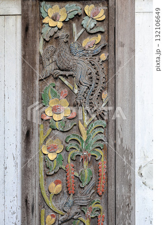 Close up old Carving wooden door with color sculptural, wood carving Door. Close up old Carving wooden door with color sculptural, wood carving Door. 132106649