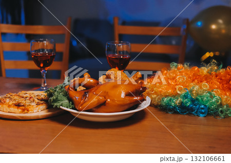 Joyful office Halloween party with coworkers in costumes, celebrating with drinks and laughter, fostering teamwork and festive spirit 132106661