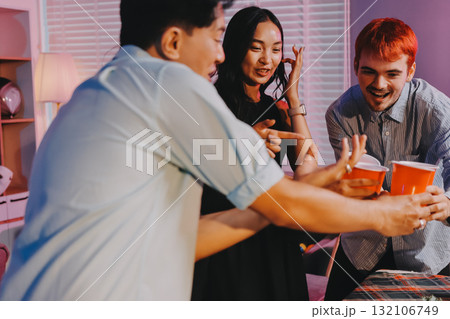 Diversity, dinner and group of people toast celebration together at party. Friends, happy and celebrate with food, wine and friendship for love, support and cheers champagne at business function 132106749