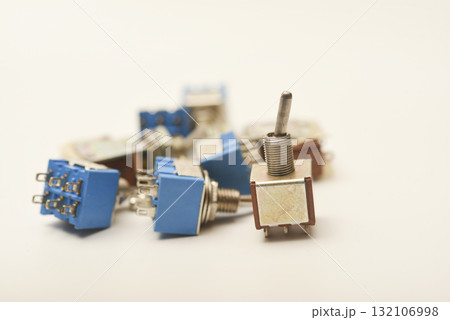 Small electric switches. Electric toggle switch. Blue switches. 132106998