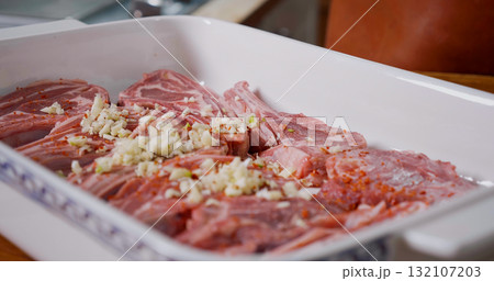Lamb Meat Seasoned With Pepper, Garlic, Salt before Cooking. Juicy Raw Lamb. Lamb Meat Seasoned With Pepper, Garlic, Salt before Cooking. Juicy Raw Lamb. 132107203