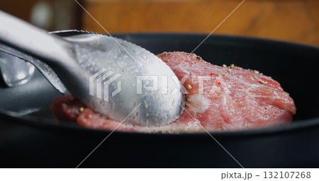 Pork Meat Seasoned is Frying in Hot Pan. Pork Meat Seasoned is Frying in Hot Pan. 132107268