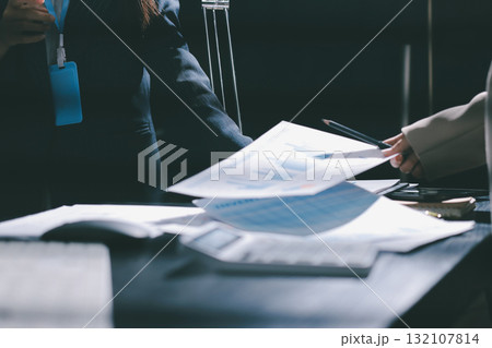 Close up high angle Asian businesswoman working with her coworker in meeting room 132107814
