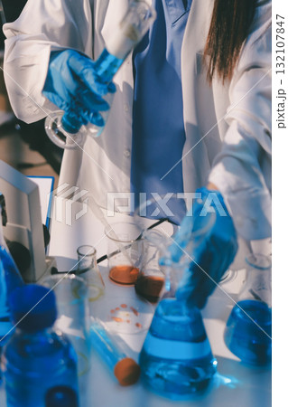 Researchers working in the clinical laboratory Researchers working in the clinical laboratory 132107847