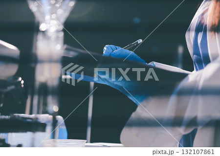 Researchers working in the clinical laboratory Researchers working in the clinical laboratory 132107861