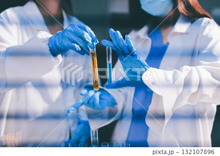 Researchers working in the clinical laboratory Researchers working in the clinical laboratory 132107896