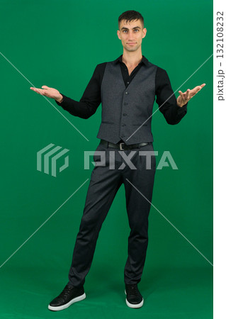 Set of videos with handsome European businessman in classic suit vest and black shirt showing different emotions gestures and confident poses on green chroma key background with copy space Set of videos with handsome European businessman in classic suit vest and black shirt showing different emotions gestures and confident poses on green chroma key background with copy space 132108232
