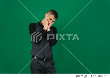Set of videos with handsome European businessman in classic suit vest and black shirt showing different emotions gestures and confident poses on green chroma key background with copy space 132108236