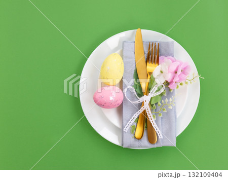 Easter celebration concept. Top view Napkin white plate eggs, isolated background, banner Easter celebration concept. Top view Napkin white plate eggs, isolated background, banner 132109404