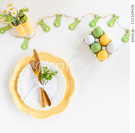 Easter celebration concept. Top view vertical empty dishes Easter eggs, isolated background, banner Easter celebration concept. Top view vertical empty dishes Easter eggs, isolated background, banner 132109426
