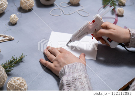 Christmas tree ribbon Gift Christmas idea. Do it yourself instruction postcard eco-friendly decoration. Making handmade presents children's diy projects. Holiday family time 132112083