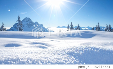スキーや冬のイメージ　青空と太陽が輝く雪原と美しい冬山の絶景風景 132114624