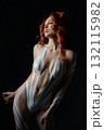 Creative body art with tape and fur featuring a beautiful woman in studio 132115982