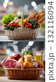 Two wicker baskets filled with assorted fresh groceries including vegetables, fruits, bread, meat, and dairy 132116094