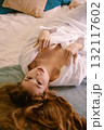 Beautiful woman in lingerie relaxing in a stylish hotel room 132117602