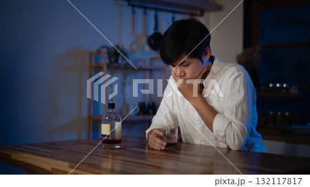 Focused gamer playing video game at night time Focused gamer playing video game at night time 132117817