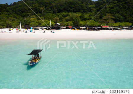 A coconut boat sits near a tropical beach on Redang Island in Malaysia. Turtle Beach A coconut boat sits near a tropical beach on Redang Island in Malaysia. Turtle Beach 132119173