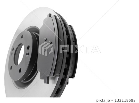 Brake discs and brake pads isolated on white background. Auto parts. Brake disc rotor isolated on white. Braking disk. Car part. Quality spare parts for car service or maintenance Brake discs and brake pads isolated on white background. Auto parts. Brake disc rotor isolated on white. Braking disk. Car part. Quality spare parts for car service or maintenance 132119688