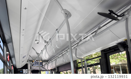 The bus inside. Interior of a modern city bus. The bus inside. Interior of a modern city bus. 132119931