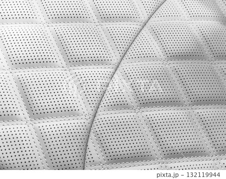 Car white leather interior. Part of perforated leather car seat details. White Perforated leather texture background. Texture, artificial leather with stitching. Perforated seats 132119944