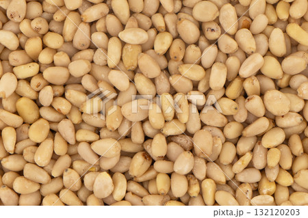 Cedar nuts texture background. Pne nuts pattern. Top view 132120203