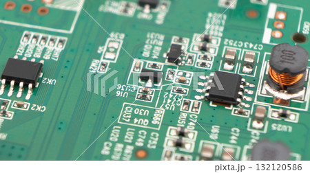 Macro shot of Circuit board with resistors microchips and electronic components background. Computer hardware technology. Integrated communication processor. Macro shot of Circuit board with resistors microchips and electronic components background. Computer hardware technology. Integrated communication processor. 132120586