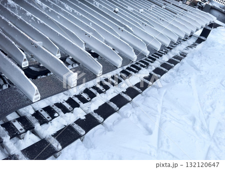 Snowcat machine for snow removal. Preparation ski trails. Snow groomer. Snowy tracks of snowcat in the mountains. Ratrac snowcat. Snow tucker 132120647