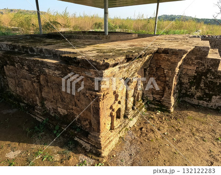 Ancient double headed eagle stupa at Sirkap site Taxila representing unique blend of Buddhist devotion and Hellenistic Gandhara culture Ancient double headed eagle stupa at Sirkap site Taxila representing unique blend of Buddhist devotion and Hellenistic Gandhara culture 132122283