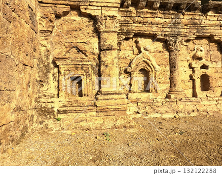 Sirkap double headed stupa showing ancient statue spaces Sirkap double headed stupa showing ancient statue spaces 132122288