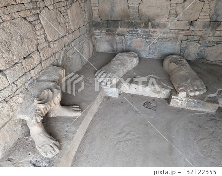 Buddha feet carved in ancient Dharmarajika site Taxila Pakistan showing sacred Buddhist heritage and spiritual symbolism 132122355
