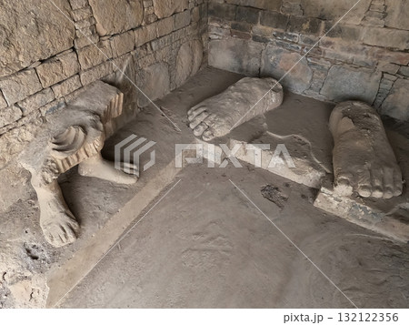 Ancient Buddha feet sculpture remains at Dharmarajika stupa Taxila Pakistan symbolizing peace devotion and Buddhist art Ancient Buddha feet sculpture remains at Dharmarajika stupa Taxila Pakistan symbolizing peace devotion and Buddhist art 132122356