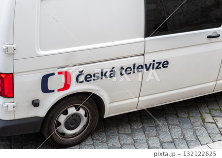 A white van with the logo of Czech National Television, parked on cobblestone street in Prague, Czech Republic 132122625