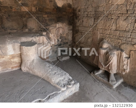 Dharmarajika Taxila ancient site showing carved Buddha feet relics representing spiritual peace and Buddhist culture 132122930
