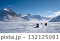 Nomads on snowmobiles navigating vast snowy plains with supplies. Life in permafrost conditions, climate change problems on the planet. Global warming 132125091