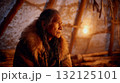 Indigenous elder telling stories inside a warm tent, frost on the outside wall. Life in permafrost conditions, climate change problems on the planet. Global warming 132125101