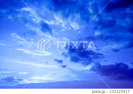 Blue tint cloudy sky at sunset. Gradient color. Sky texture. Abstract natural background Blue tint cloudy sky at sunset. Gradient color. Sky texture. Abstract natural background 132125417