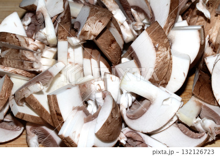 Close up of chopped chestnut mushrooms ready to be cooked fresh produce 132126723